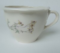 http://www.francesleeceramics.com/files/gimgs/th-34_large cup with yellow flowers web.jpg